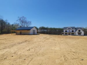 Custom White Barn Matching House Saunders Construction Stoneville NC