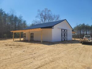 Custom White Barn with Black Accents Saunders Construction Stoneville NC