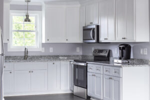 Custom Lake Garage Apartment White Cabinets New London NC